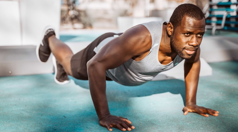 Man doing push ups.