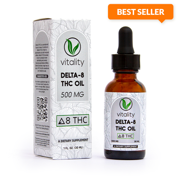 Bottle of Vitality's Delta-8 oil next to the package it comes in. 