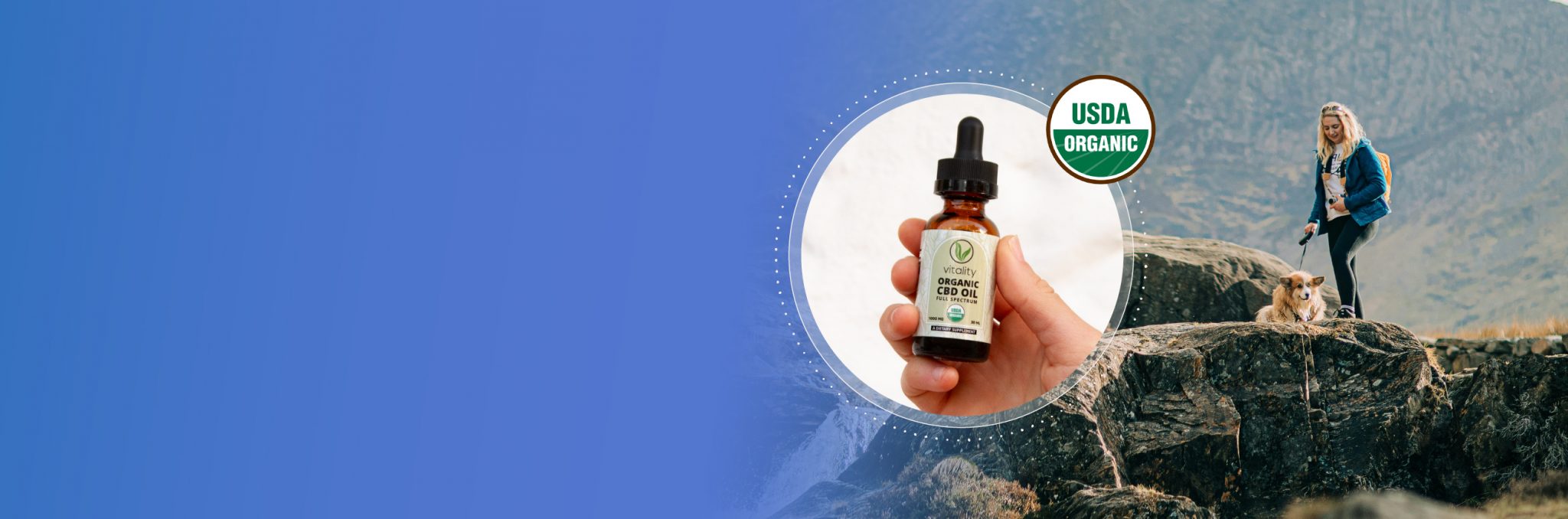 Hand holding a bottle of Vitality CBD oil.