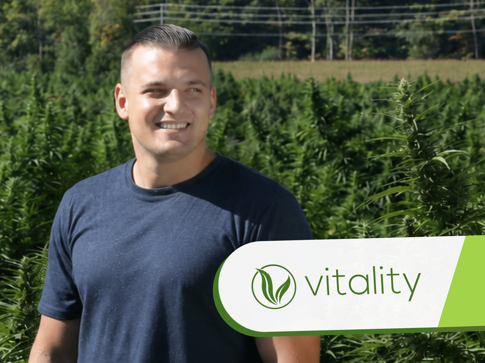 Scott Mazza with a hemp field in the background.